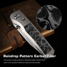 Remette RT-Aurora-D M390 / Titanium Raindrop Carbon Fiber