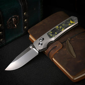 Remette RT-Aurora-Y M390 / Titanium Raindrop Carbon Fiber